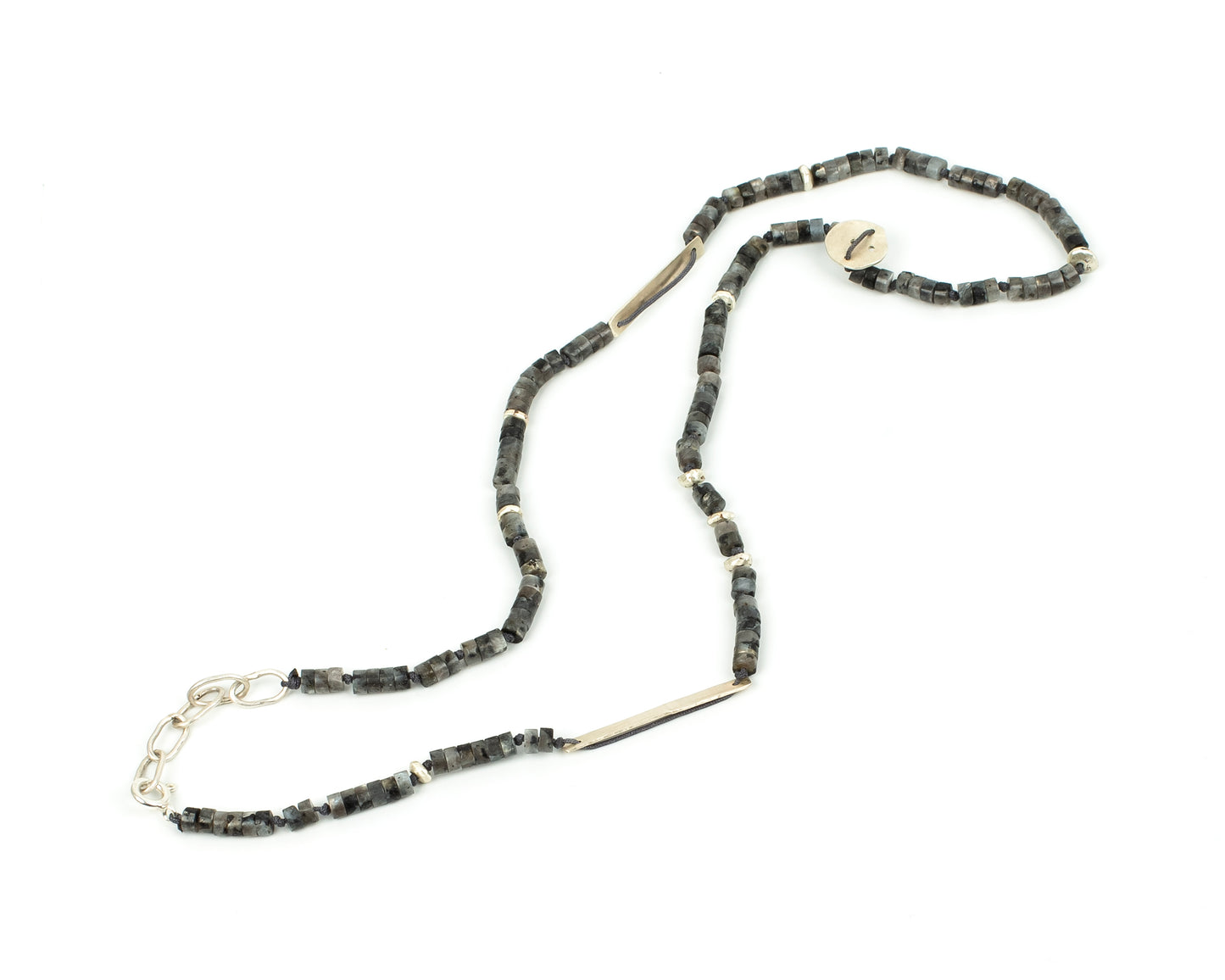 Necklace with brown green beads and silver chain on a white background